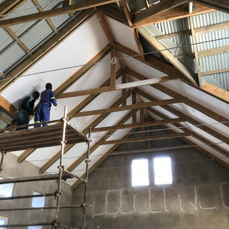 Polystyrene Installation in between Trusses | Thermaboards
