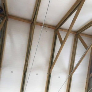 Polystyrene Installation over Exposed Trusses | Thermaboards